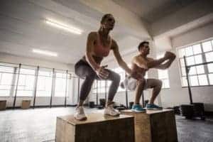 couple do jumping squats together